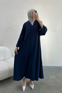 Modest jurk met lint
