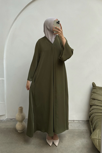Modest jurk met lint